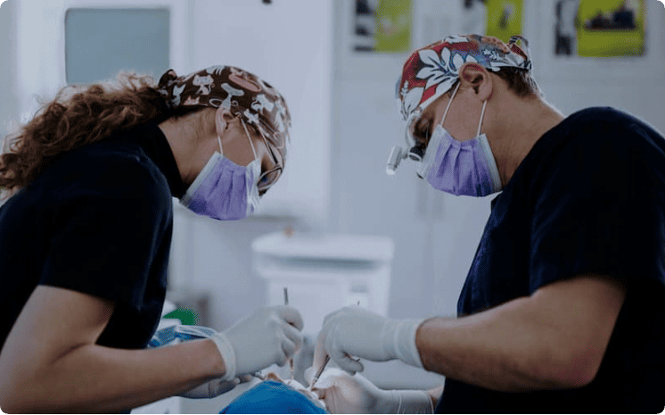 Apikotomija uz operacijski mikroskop